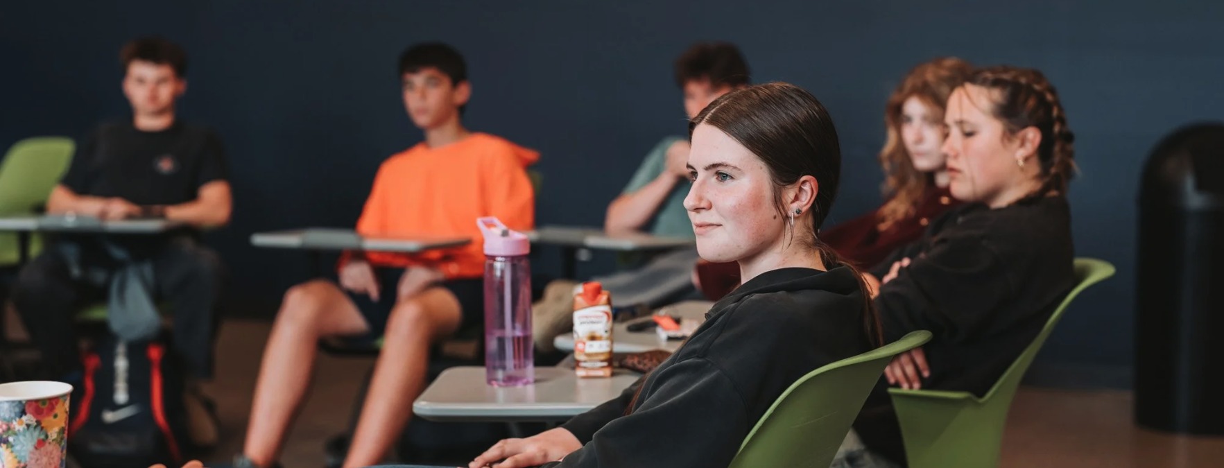 Trinity high school students listening during class