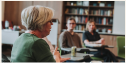 Teacher leading a small-group discussion