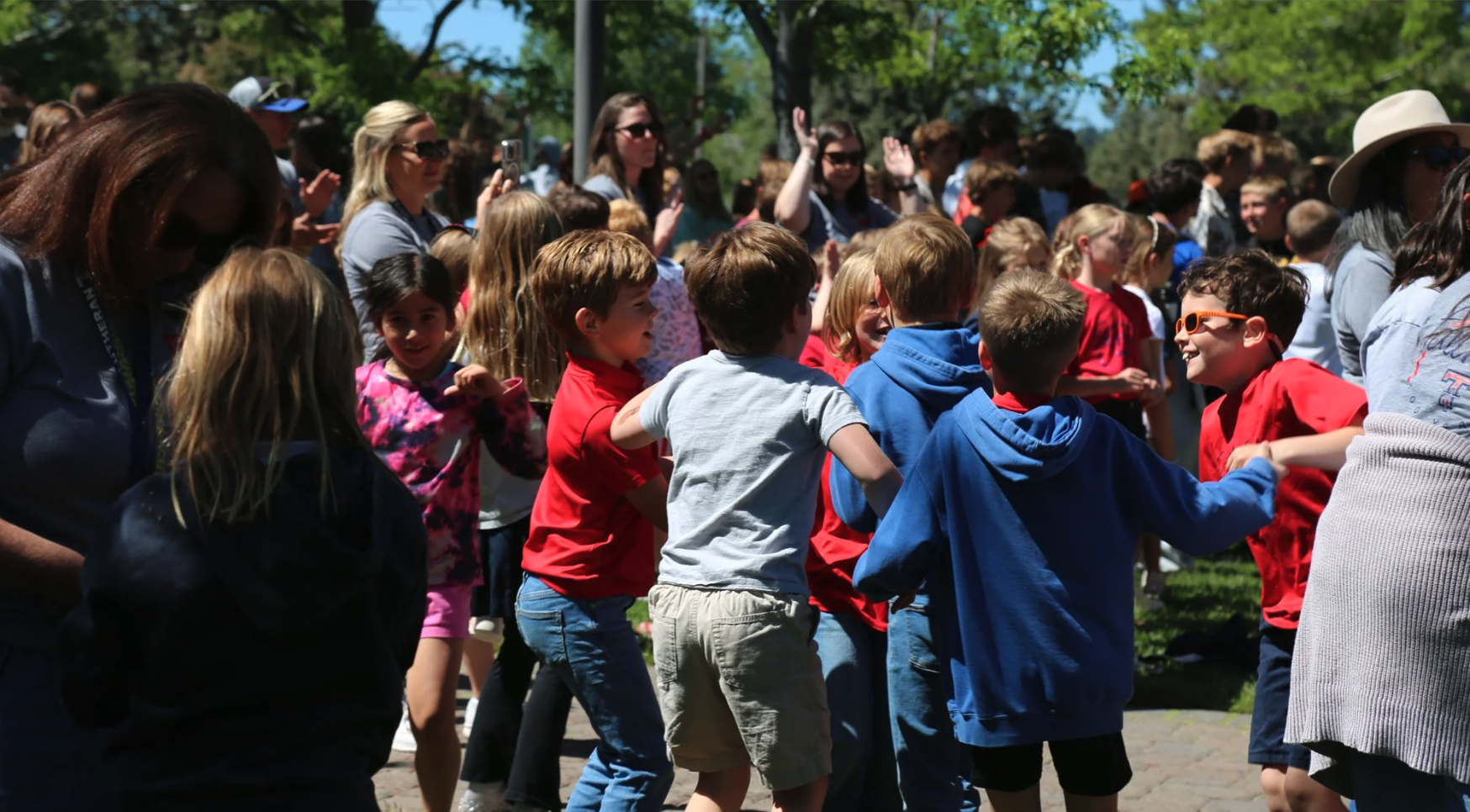 Trinity students celebrating together outdoors
