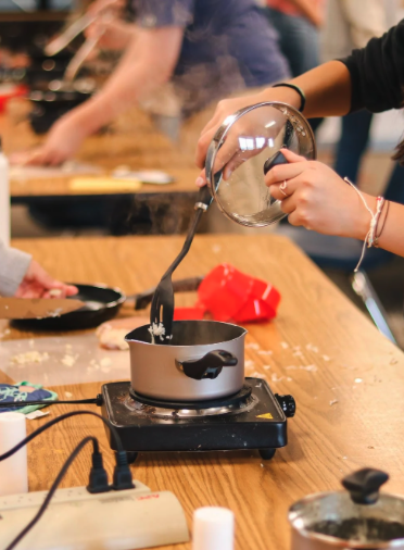 Students cooking in a Trinity life-skills class